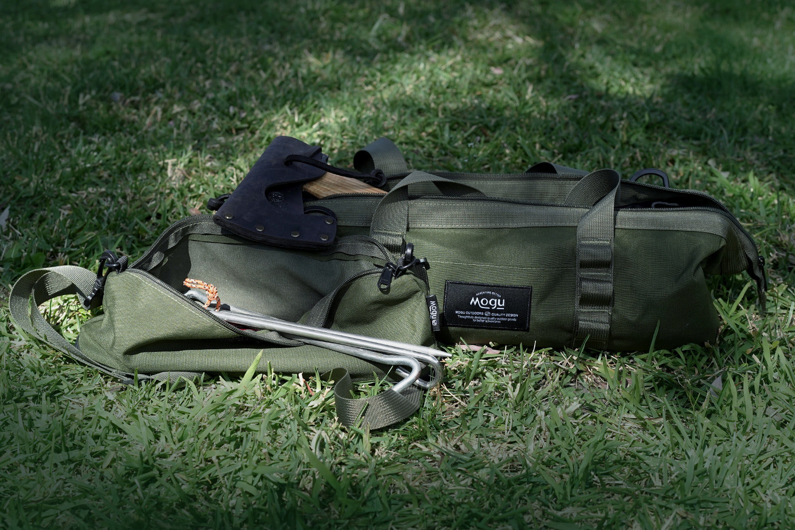 Stylish Utility tool bag and inner peg carry bag together on the grass