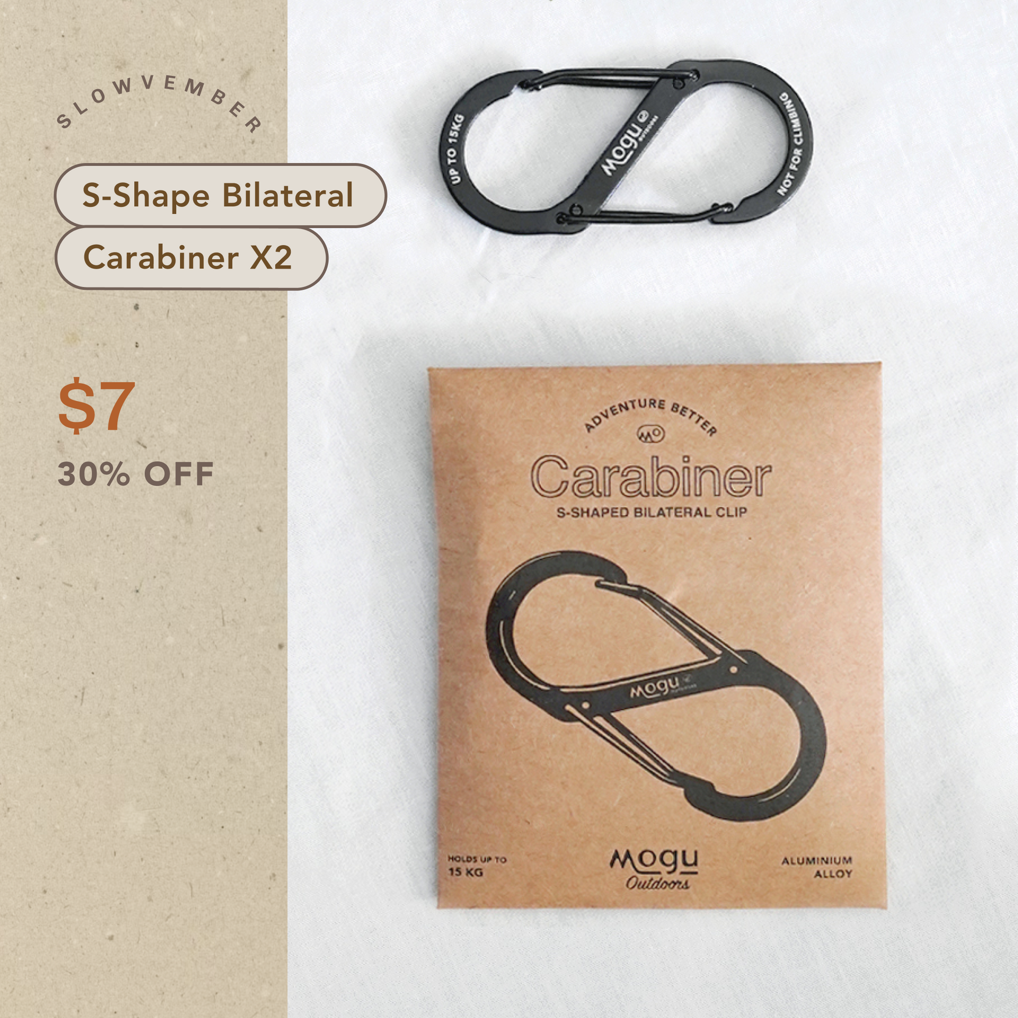 Black carabiner with 'MOGU' branding on a white background, next to its packaging pouch of 2 s-shape carabiners 